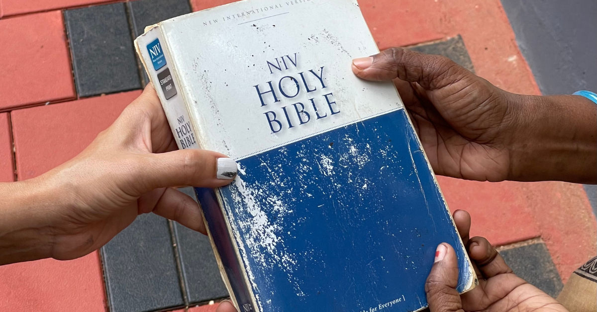 Bible in the hands of a believer