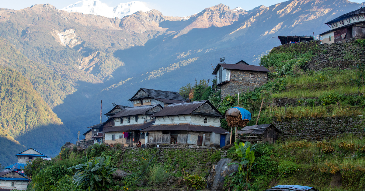 Mountains in the backdrop of a village in Nepal